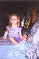 Kettie with her broken arm.  Summer 2001.