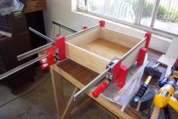 George glues up his nightstand drawer